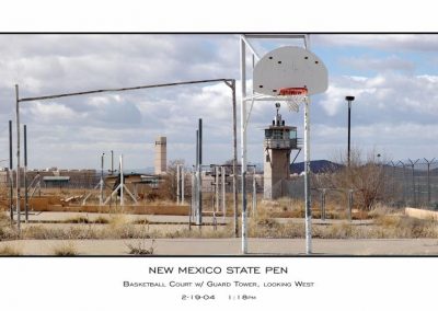 Basketball court with guard tower, looking west at Old Main