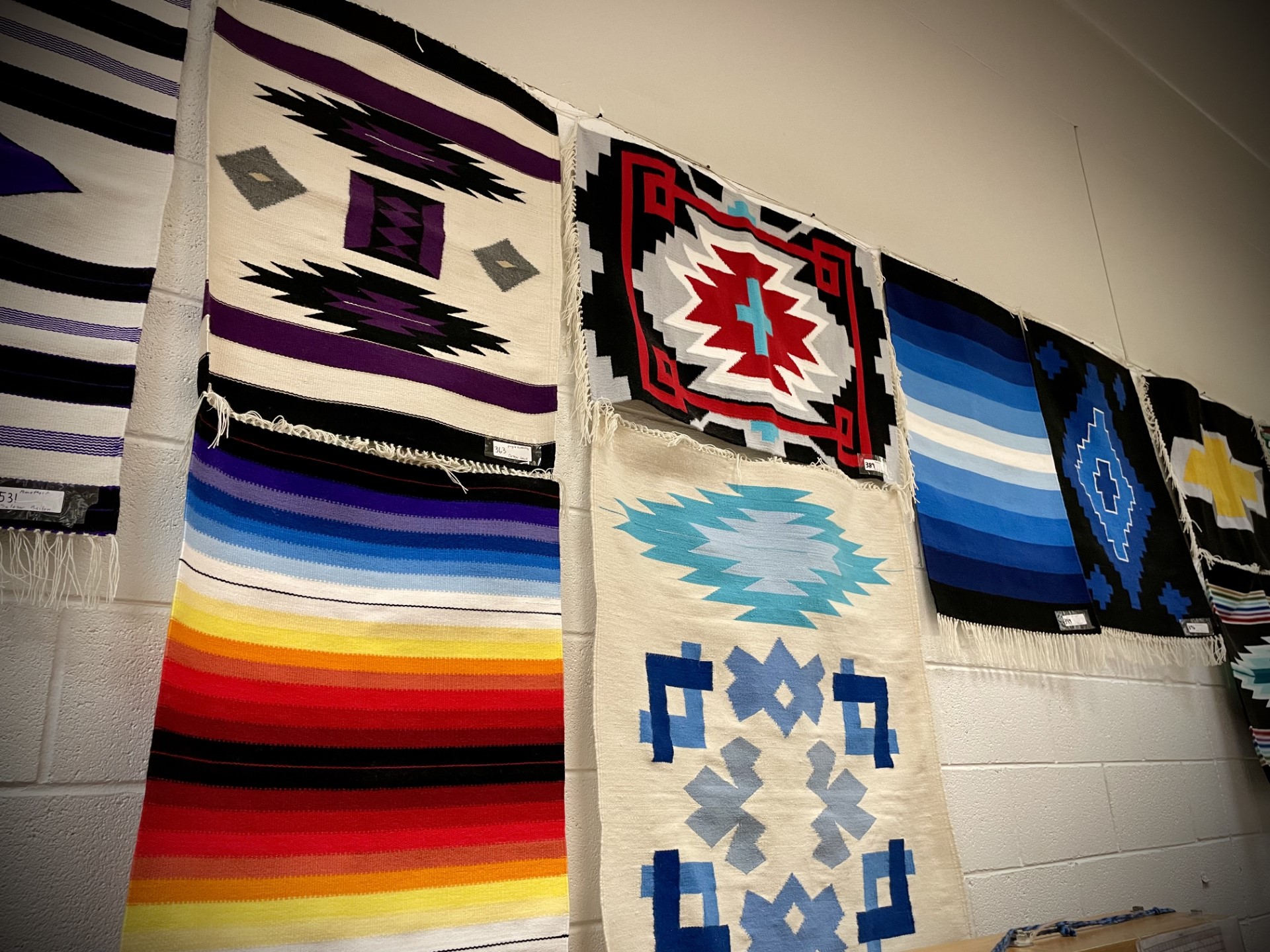 Woven rugs on display