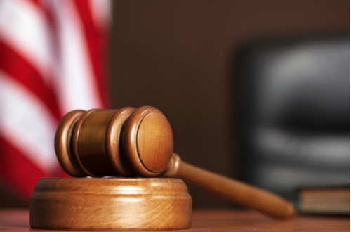 Gavel resting on a judge's desk